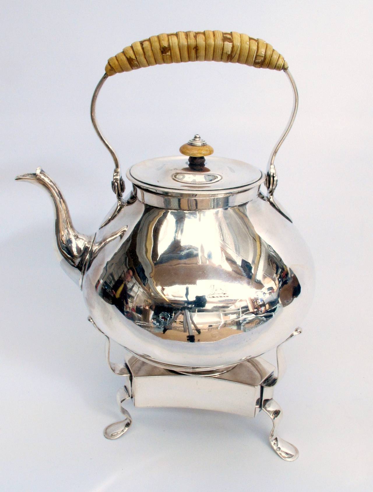 Elegant sterling silver water kettle and stand by Thomas Heming. 
London 1763

9.5