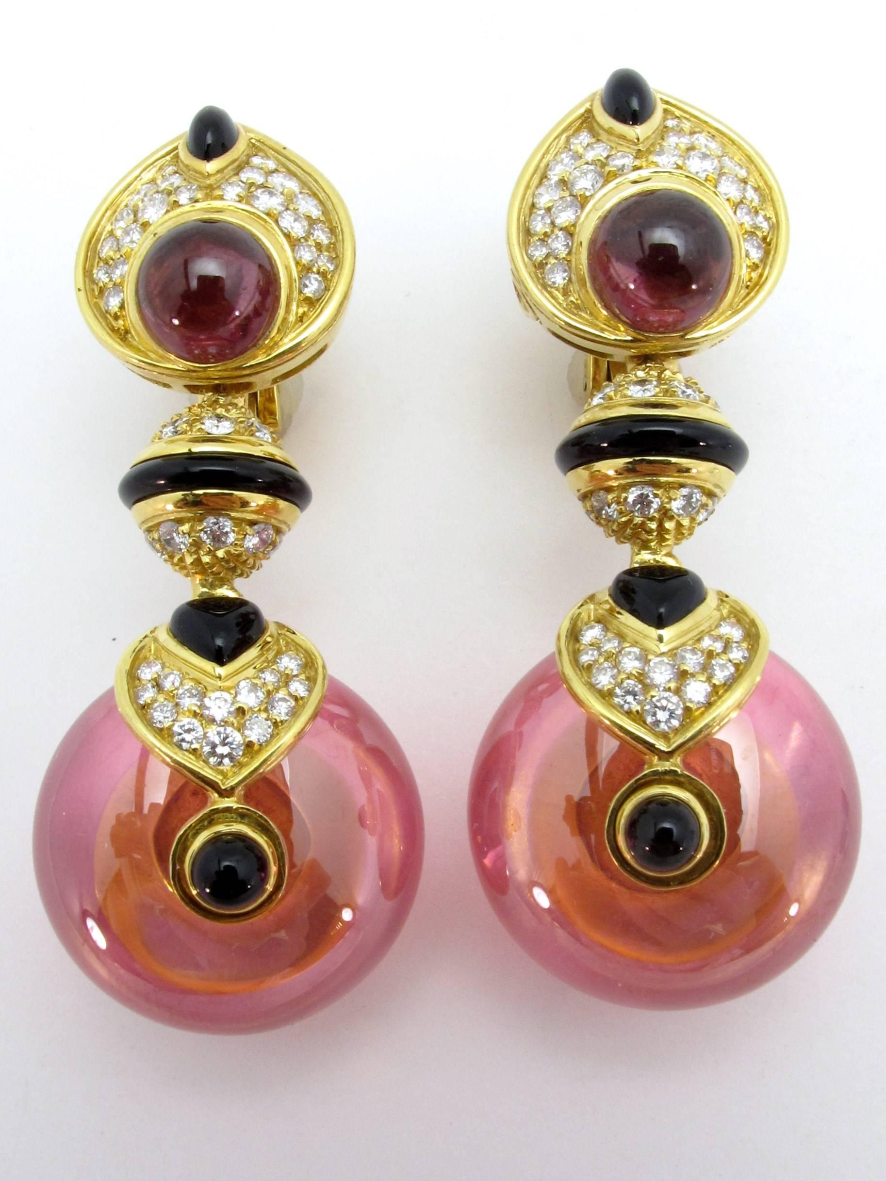 A pair of 18kt yellow gold diamond, tourmaline and onyx drop earrings with interchangeable blue or pink crystal drops. Includes box and screw, signed Marina B.