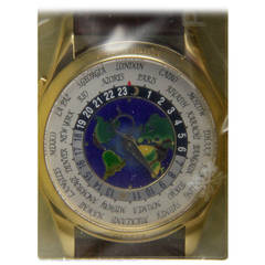 Patek Philippe Yellow Gold World Time Watch with Guilloche Map Dial Ref 5131J