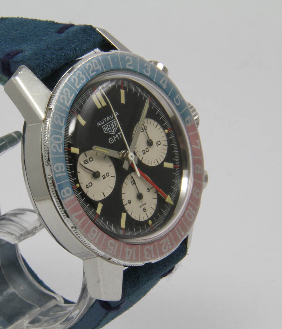 Heuer
Autavia GMT
Ref. 2446C

Case
Stainless steel, acrylic glass, rotating bezel, 39mm

Movement
Valjoux 724, manual-wind, chronograph, 24-hour indicator, second time zone

Dial
Original black dial and hands

*
very nice