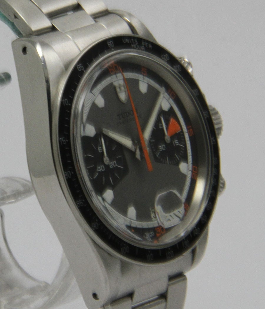 Tudor
Monte Carlo Home Plate Chronograph
Ref. 7031/0

Case
Stainless steel, screw back, acrylic glass, Rolex screw-down crown, screw-down buttons, 39.5mm

Movement
caliber Valjoux 7734, manual-wind, chronograph, date

Dial
Gray dial with