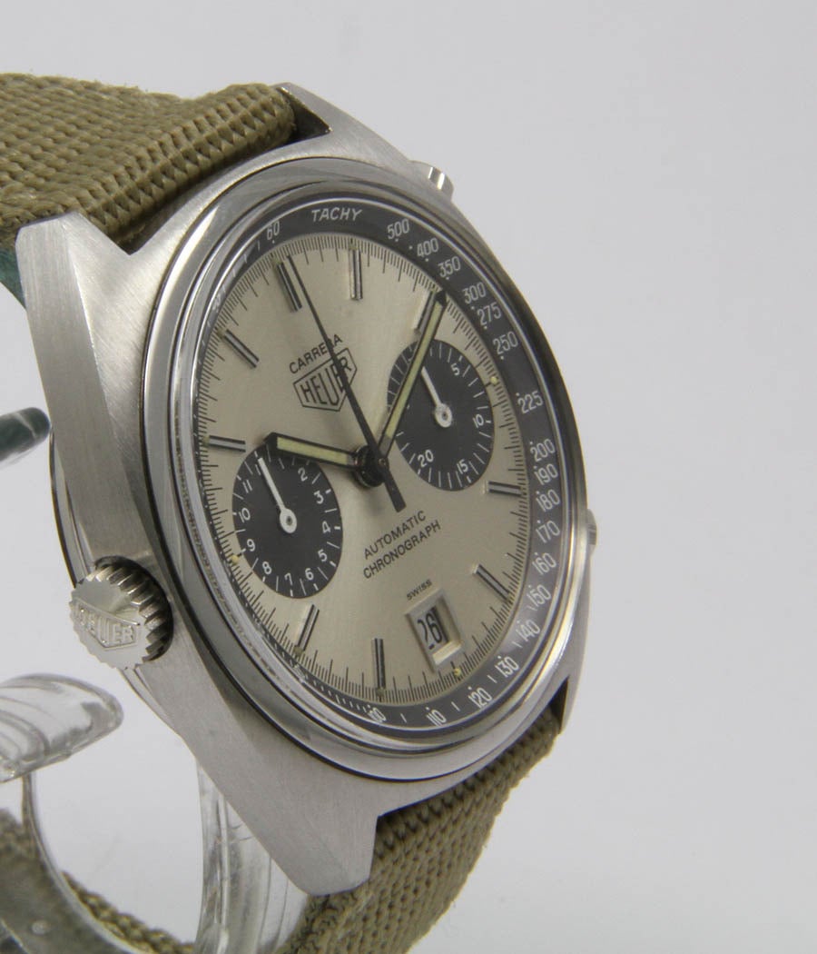 Carrera-Ref. 110.253
Case-Screwed case, steel, acrylic glass, d=38,5mm
Movement-11 (Buren) , automatic, chronograph, date
Dial-Original dial and hands
Bracelet-Textile strap, buckle

Very nice condition
1975
