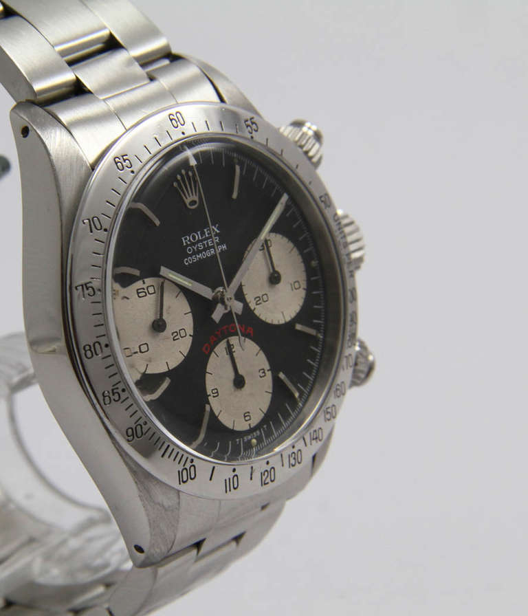 Rolex 
Daytona Cosmograph
Ref. 6265

Case - Stainless steel, screw back, acrylic glass, screw-down crown, screw-down pushers, 37mm, case no. 8.9mil
Movement - Caliber 727, manual wind, chronograph.
Dial - Original Tritium dial and