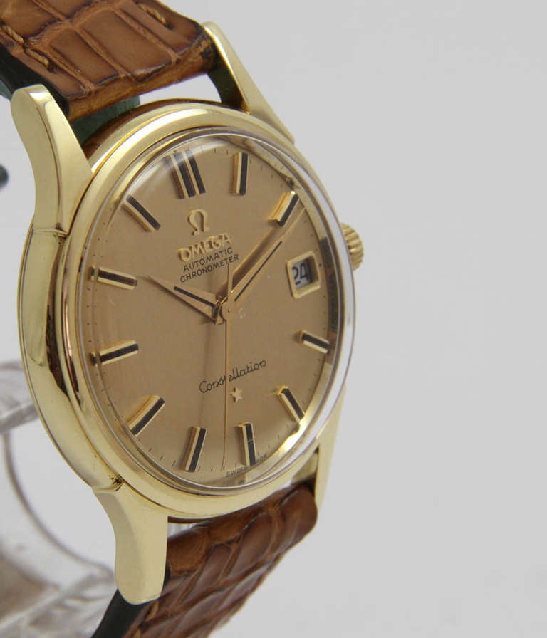 Omega
Constellation
Ref. 14393

Case - yellow gold, screw back, acrylic glass.
Movement - Caliber Omega 561, 24 jewels, automatic, chronometer, date.
Dial - Original gilt dial.
Strap - Leather strap, buckle.

Box and paper, service paper,