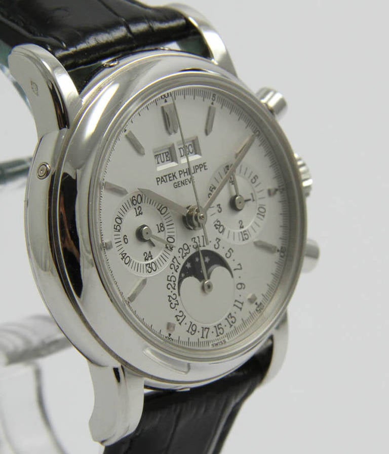 Patek Philippe
Ref. 3970P
Perpetual calendar chronograph

Case
Platinum, screw back, sapphire crystal, sapphire crystal back, spare solid platinum back, 36mm

Movement
Caliber 27 70 Q, manual-wind, seal of Geneva, chronograph, perpetual