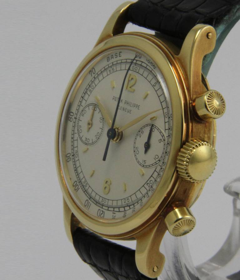 Patek Philippe
Ref. 1463

Case
18k yellow gold, screw back, acrylic glass, 35mm

Movement
13''', manual wind

Dial
Original dial and hands

Bracelet
Original croco leather strap with Patek Philippe 18k gold buckle 

*
Rare and nice