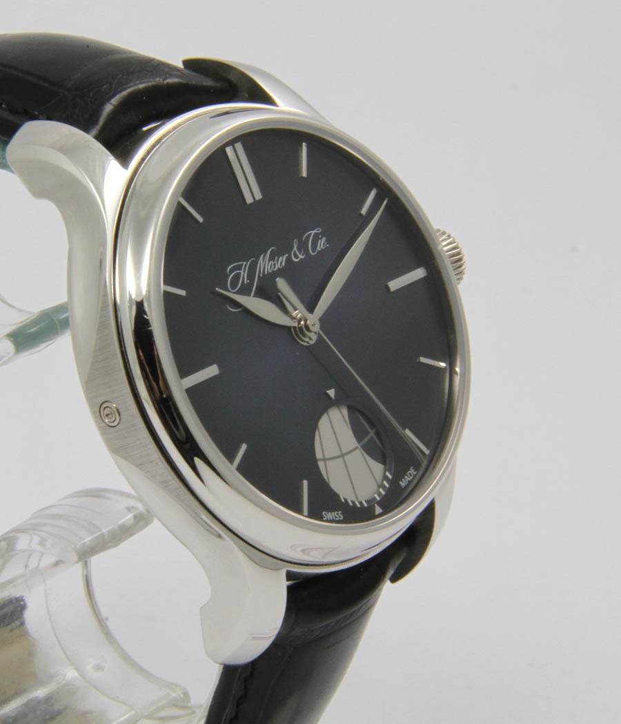 H. Moser & Cie
Ref. 348.901-015
Power Reserve Perpetuel Moon

Case
Platinum, back secured by screws, sapphire crystal, sapphire crystal case back, 41mm

Movement
Manual-wind, power reserve, moon phases

Bracelet
croco-leather strap, with