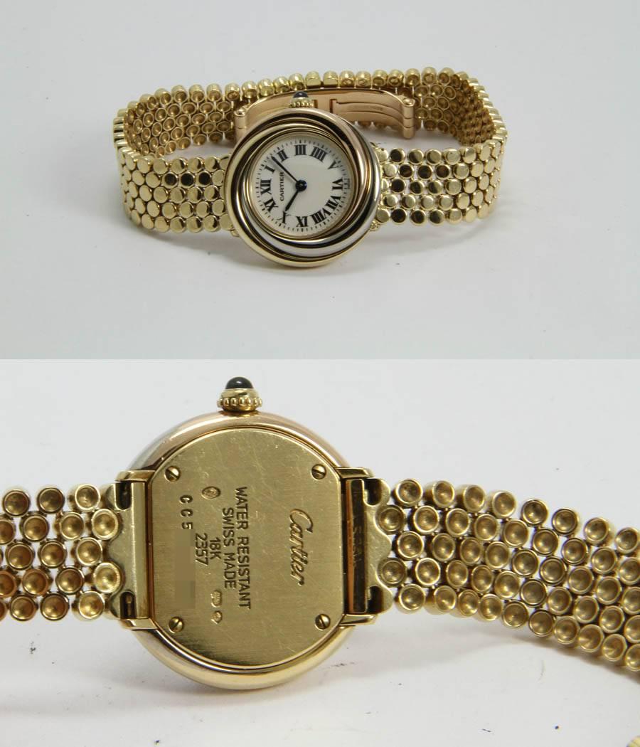 Women's Cartier Lady's yellow gold Trinity Quartz Wristwatch Ref 2385  For Sale