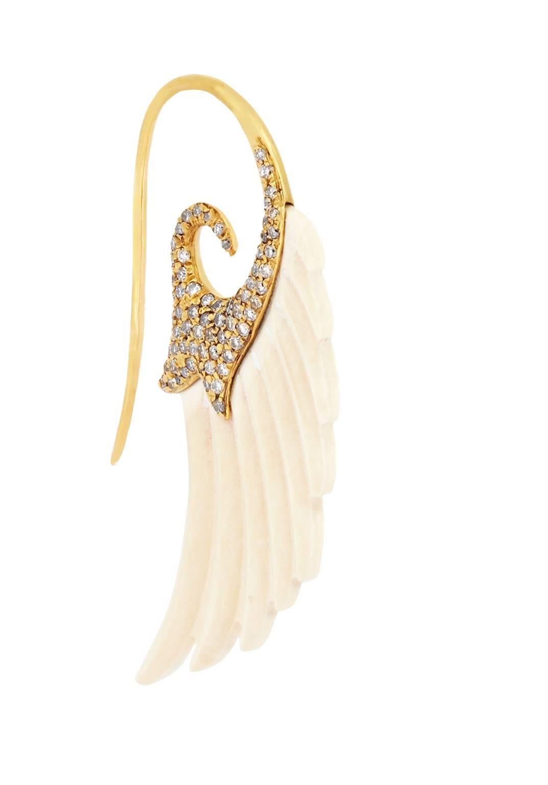 Noor Fares' iconic Fly Me to the Moon Wing Earrings
* Carved Mammoth bone
* Yellow gold embellished with diamond pave on one side
* Diamond weight: 0.85cts
* Hook