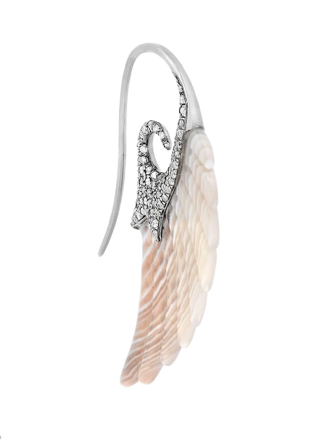 Noor Fares' iconic Fly Me to the Moon Wing Earrings
* Carved Botswana Agate
* Black gold embellished with diamond pave on one side
* Diamond weight: 0.85cts
* Hook
NOTE: Agate varies in colour from Grey to Brown to Orange and each carved piece