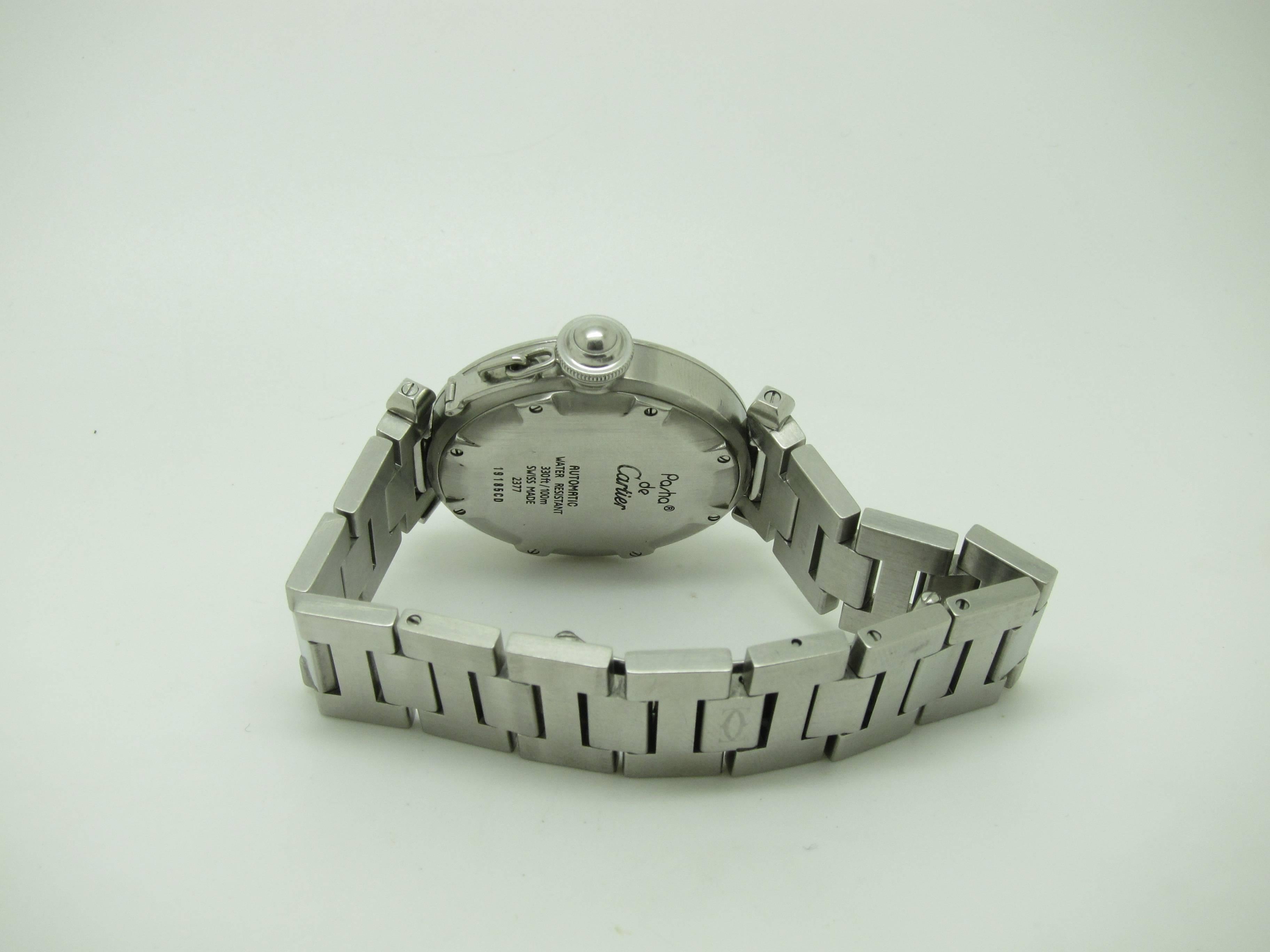 Cartier Pasha Steel mundi. 

Automatic mouvement in excellent working condition.

Wrist circumference 18.5cm
38mm  dial