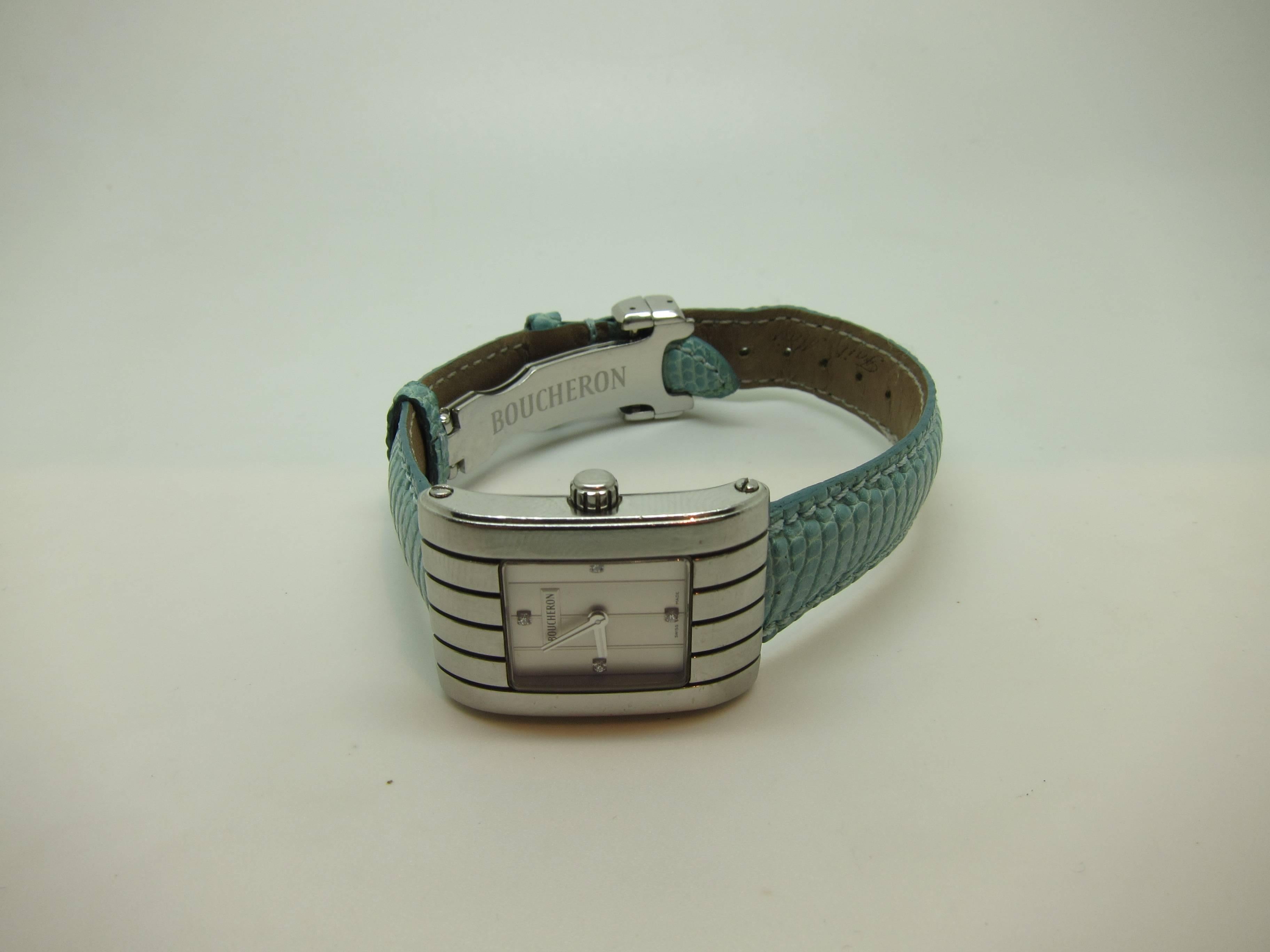 Nice Boucheron reflet watch in brushed steel with 4 diamonds in the watch.

Buckle from Boucheron but band is a generic leather band.

Nice condition but some signs of wear due to normal use (light scratches in the steel case)