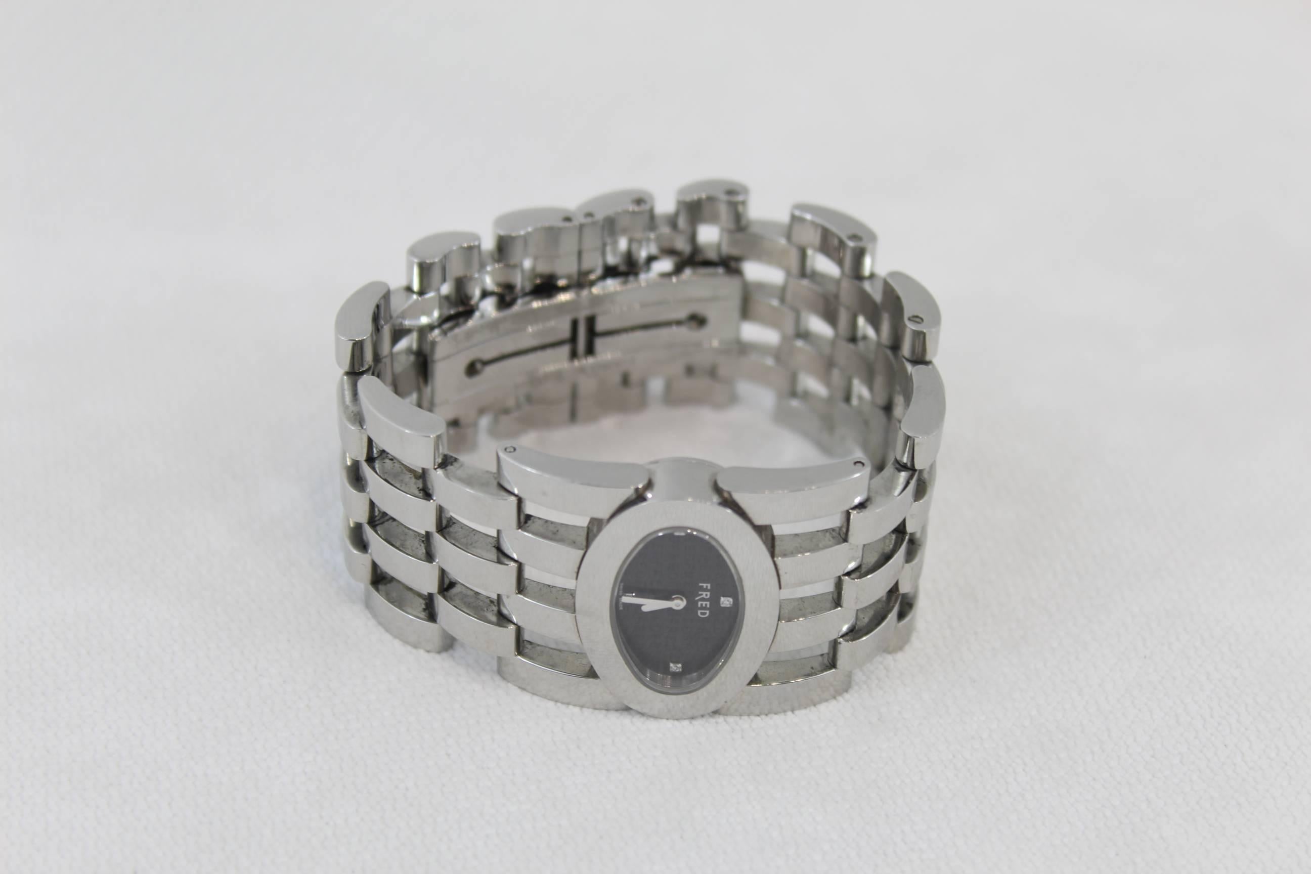 Fred Pretty Wman Uhr. 
4 Diamanten im Zifferblatt
Gesamtumfang des Handgelenks max. 16 cm
Guter Zustand mit leichten Gebrauchsspuren