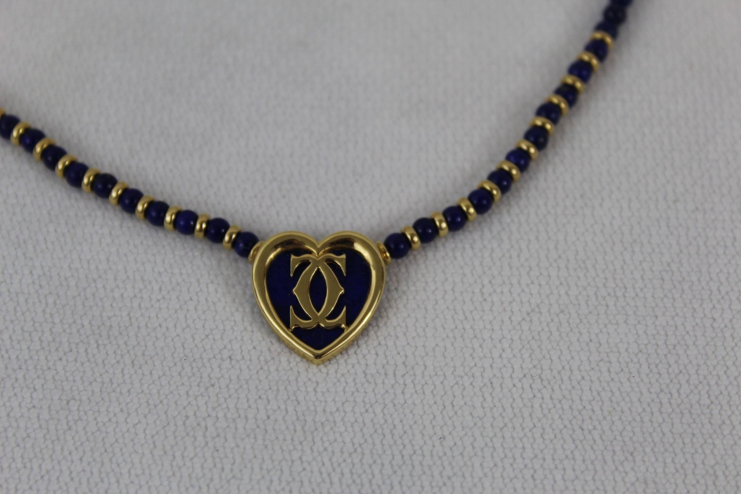 Really nice Necklace from Cartier in gold and lapis lazuli with a heart on it.

It is signed in the heart.

Really nice condition

Size: 15
