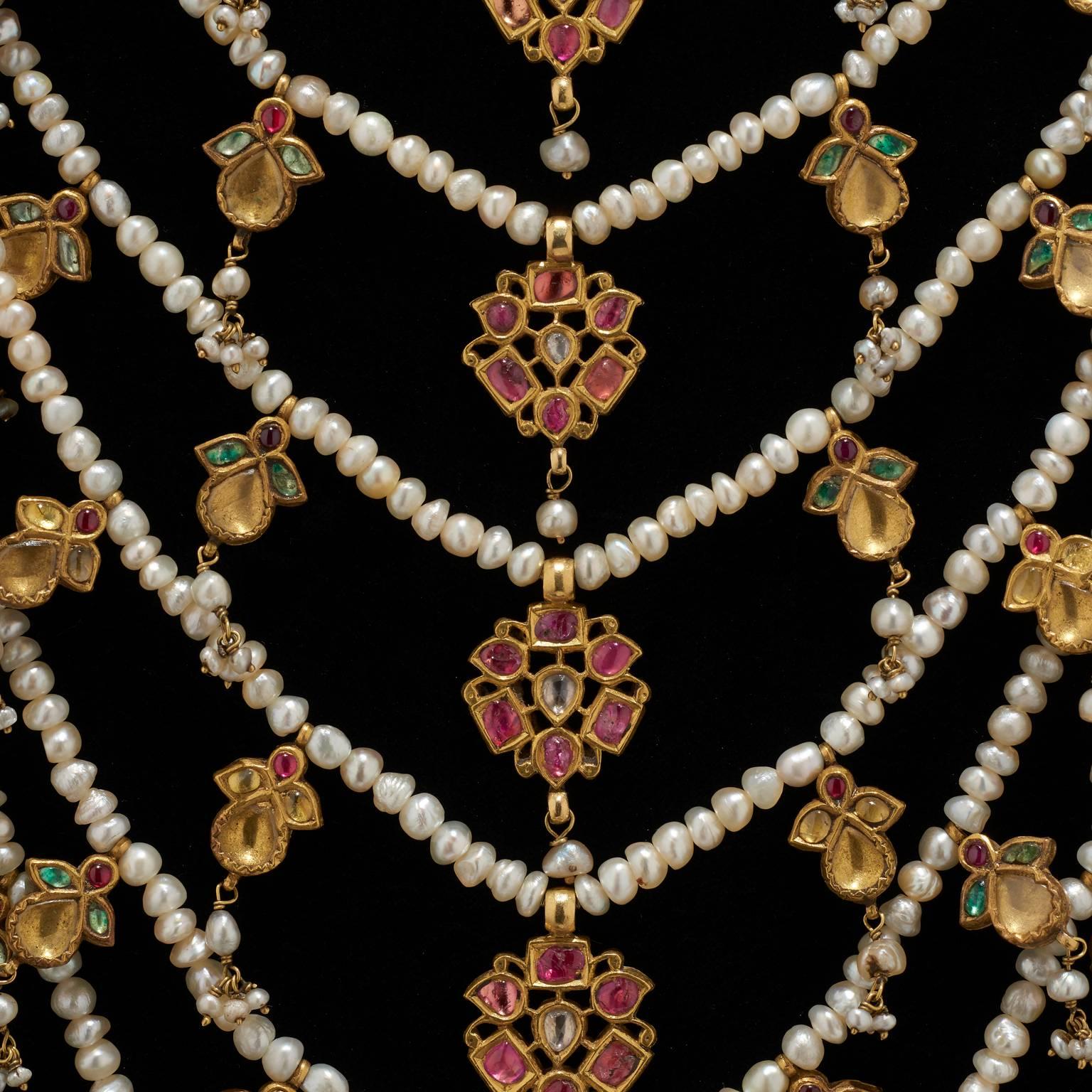 multi-strand necklaces with pearls and precious stones