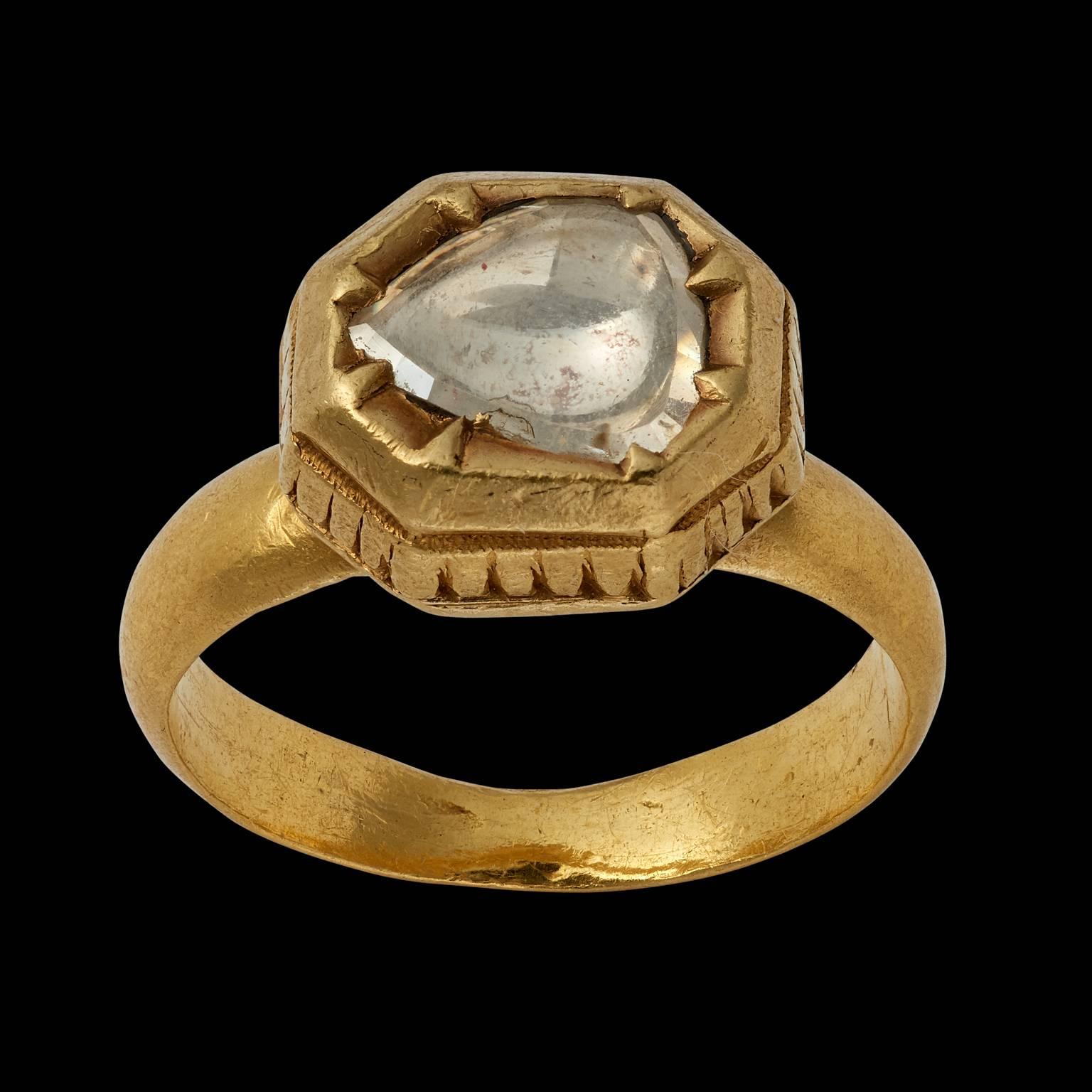 Ring
Rajasthan, North India
Early 19th century

Gold with a single foiled diamond. 

