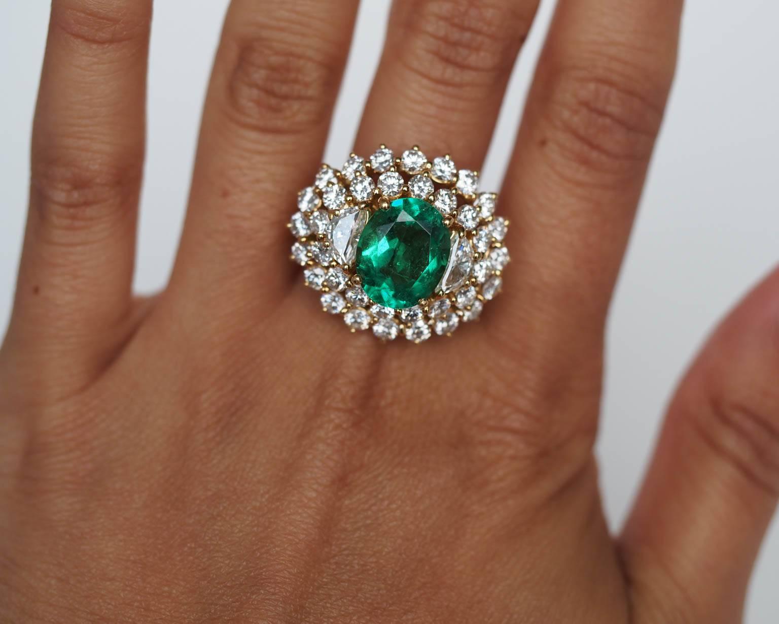 Here is an awesome piece, with extremely well crafted components. The center stone is a 3.94ct Natural Emerald, with Insignificant enhancement. The origin on the piece is COLOMBIA, which is know to house the finest quality gems in the world. The