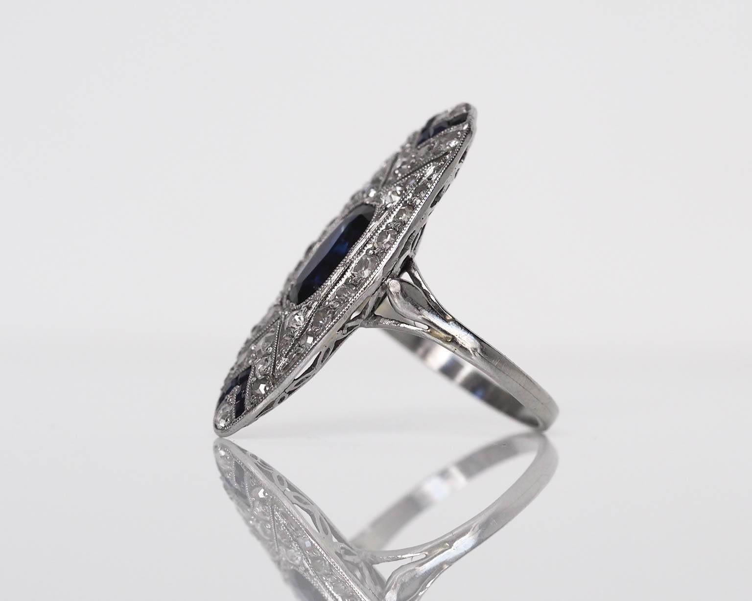 Here we have a beautiful piece which absolutely epitomized Art Deco. What we really appreciate and enjoy about this ring is the high quality of diamonds use throughout. The diamonds are ultra white F color and extremely clean VS quality diamonds as