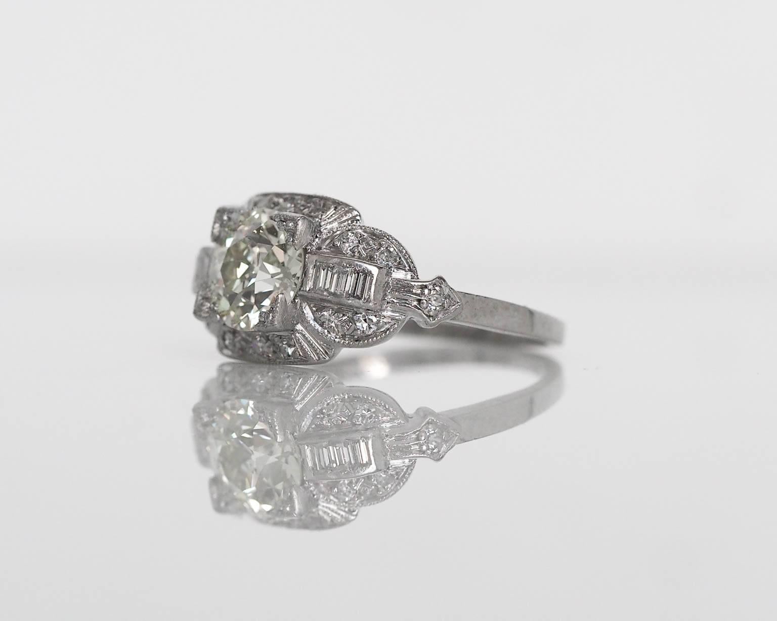 Here is a really special DECO engagement ring. The piece has many inner shank engravings and hallmarks, which really is rare to find in complete intact at this stage! Signed 