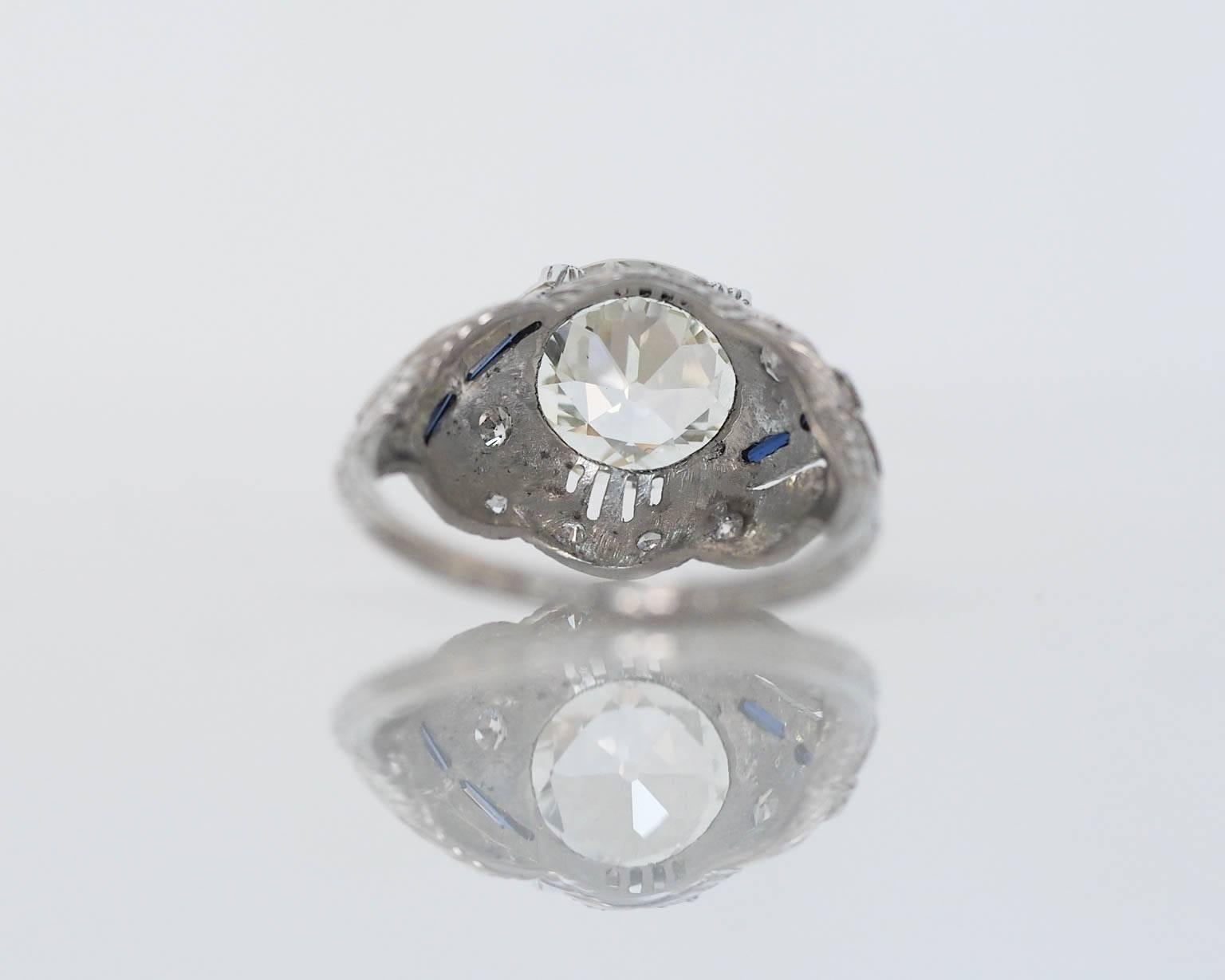 Here we have an absolutely STUNNING, jaw-dropping art-deco beauty.. literally like NO OTHER! Wow, so many amazing antique features all over. Lets start with the center diamond itself, because obviously, all eyes on it! Featuring a beautiful original