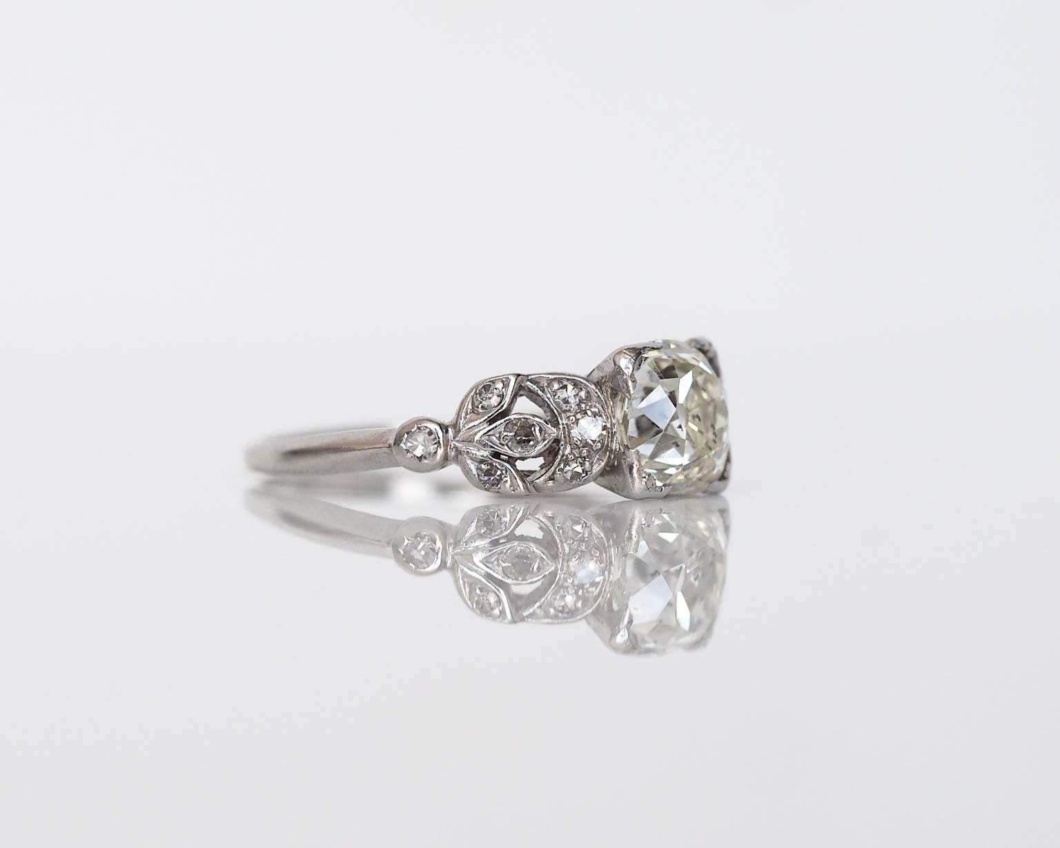 Here we have a classic and timeless style. The center stone is a 1.60ct Old Cushion Brilliant Cut diamond with an amazing fire. The old cushion center stone has an amazing look, with a very large culet which you can see looking face up and it just