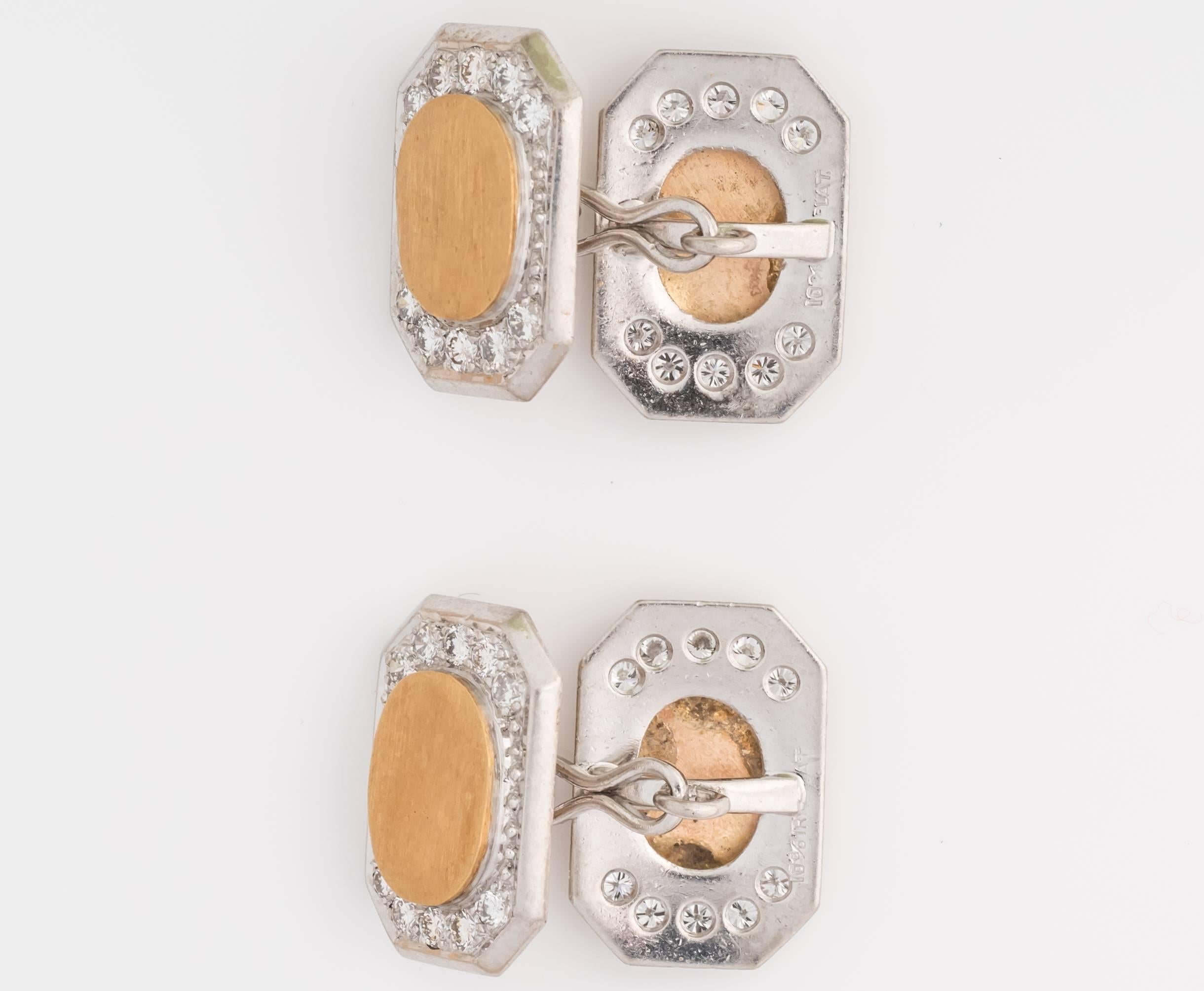 Unique pair of cufflinks with diamonds crafted in 18kt yellow gold and platinum. These are cufflinks belonging to circa 1950s. All diamonds are F color and VVS in clarity. Total carat weight of diamonds is 2.10cts and all diamonds are round
