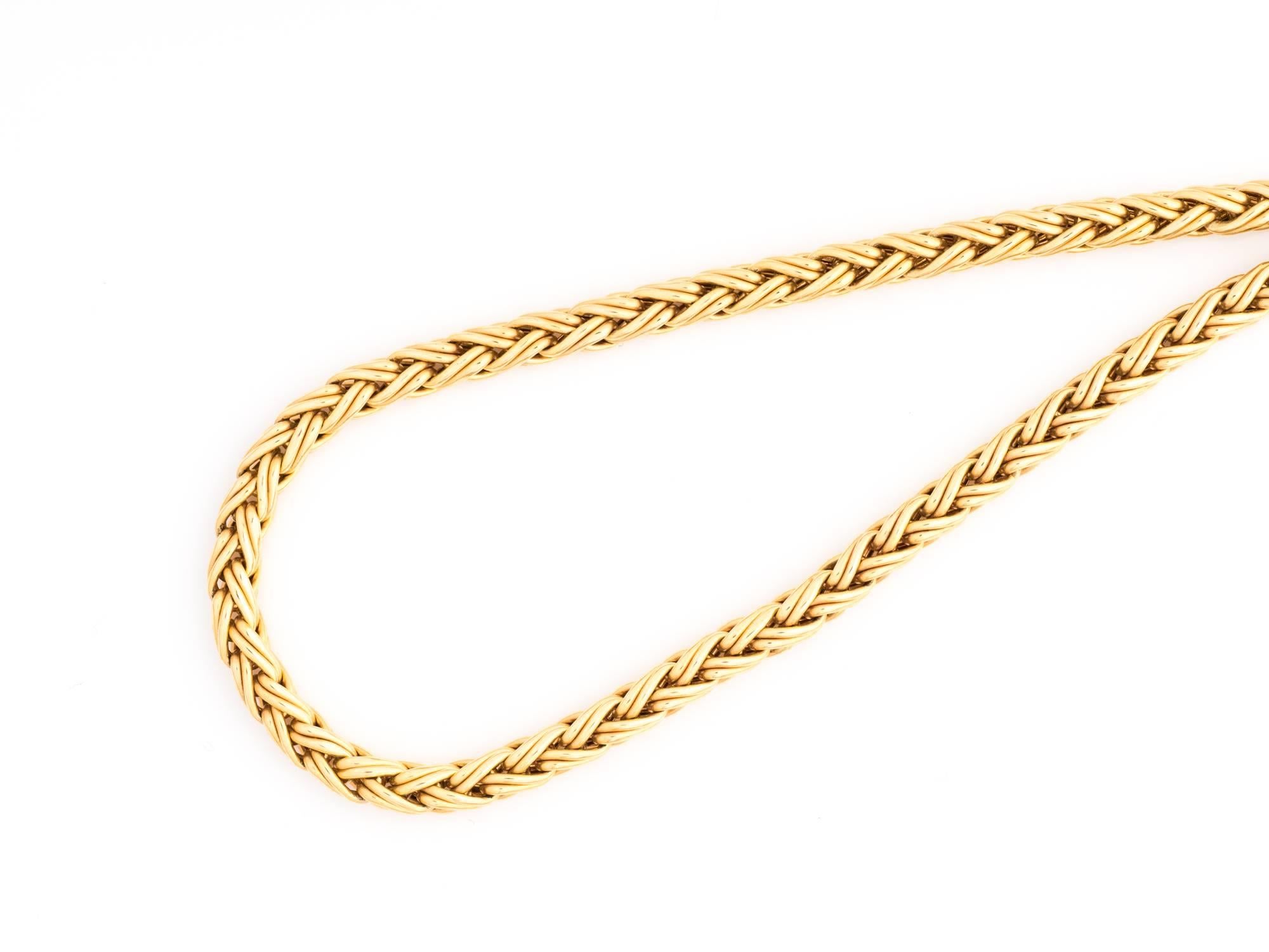 1960s Tiffany & Co. 14 Karat Yellow Gold Wheat Braided Chain Necklace

16 Inches long, 4.2 mm thick Wheat Braided Chain in rich 14K Yellow Gold
The clasp is hallmarked Tiffany & Co.
This gorgeous necklace comes with the Signature Blue Tiffany & Co.