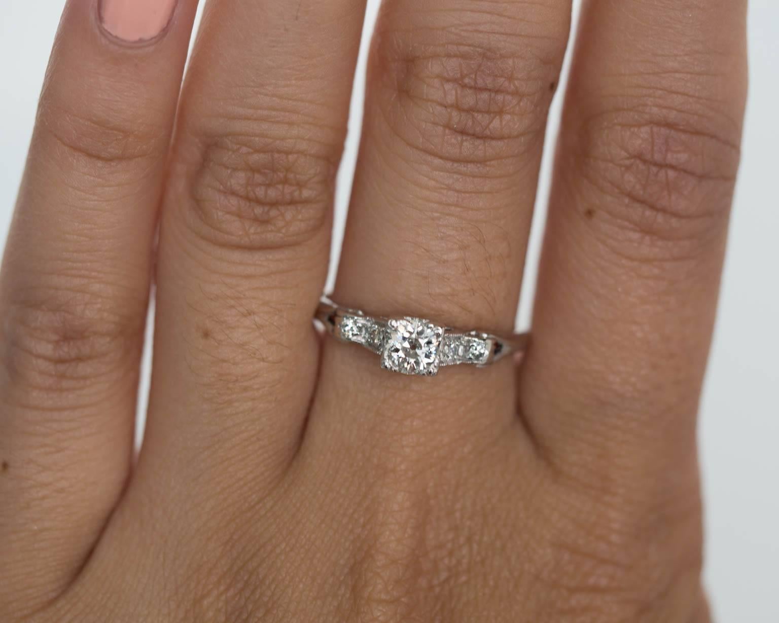 1920s Art Deco GIA Certified .31 Carat Diamond Platinum Engagement Ring In Excellent Condition In Atlanta, GA