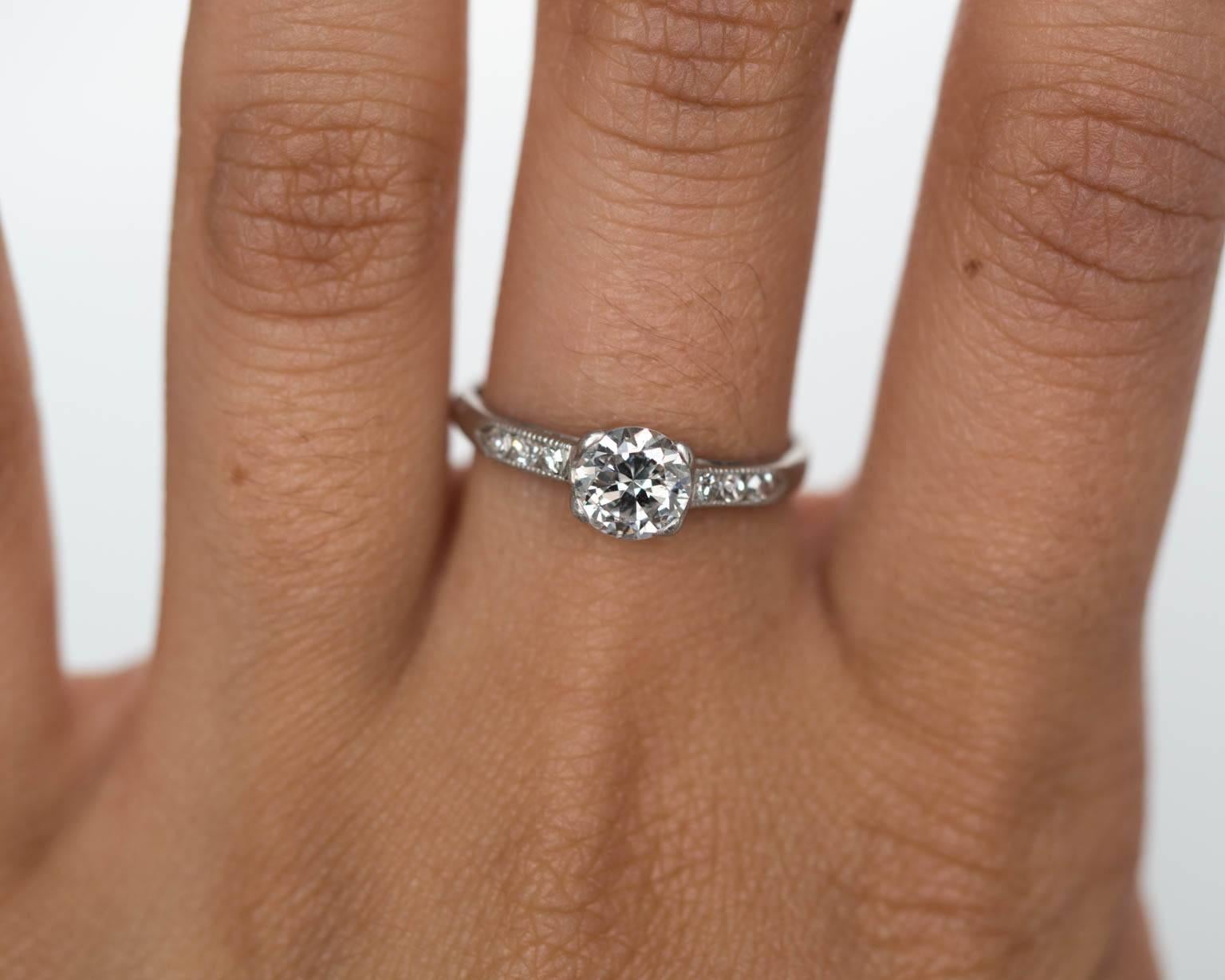1940s Art Deco GIA Certified .66 Carat Diamond Platinum Engagement Ring For Sale 2