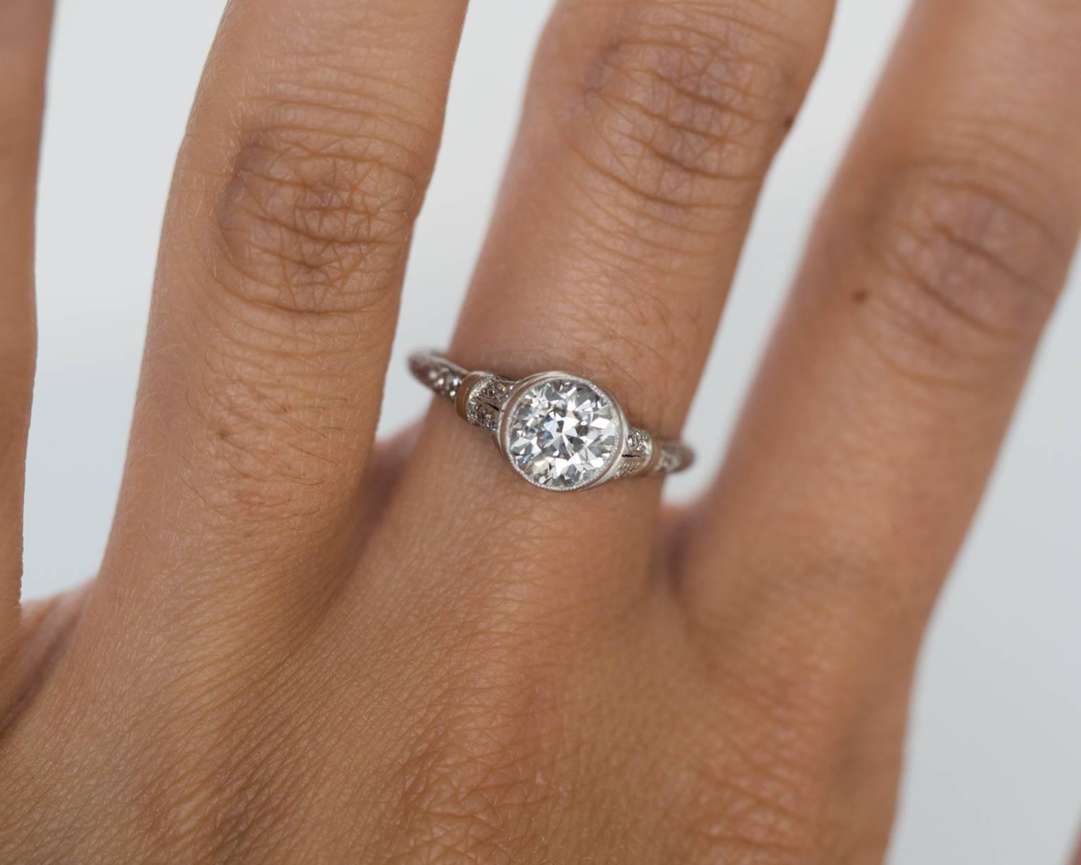 1920s Art Deco Platinum 1.01 carat Diamond Engagement Ring with Side Stones 2