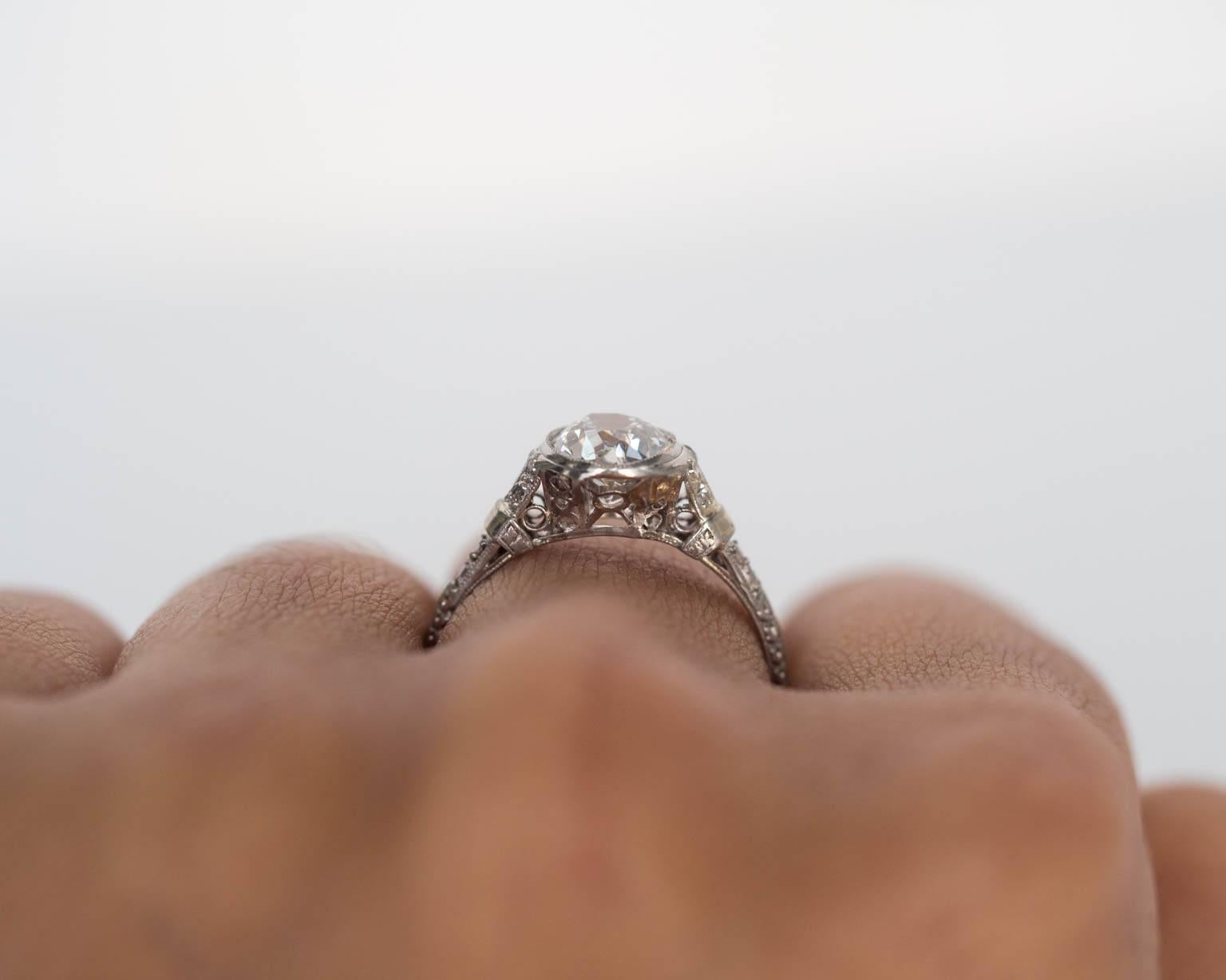1920s Art Deco Platinum 1.01 carat Diamond Engagement Ring with Side Stones 3