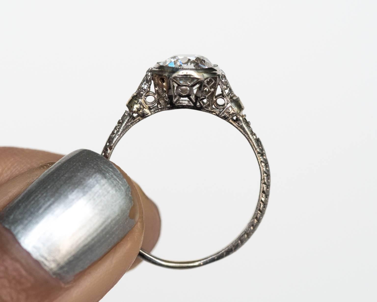 1920s Art Deco Platinum 1.01 carat Diamond Engagement Ring with Side Stones 4