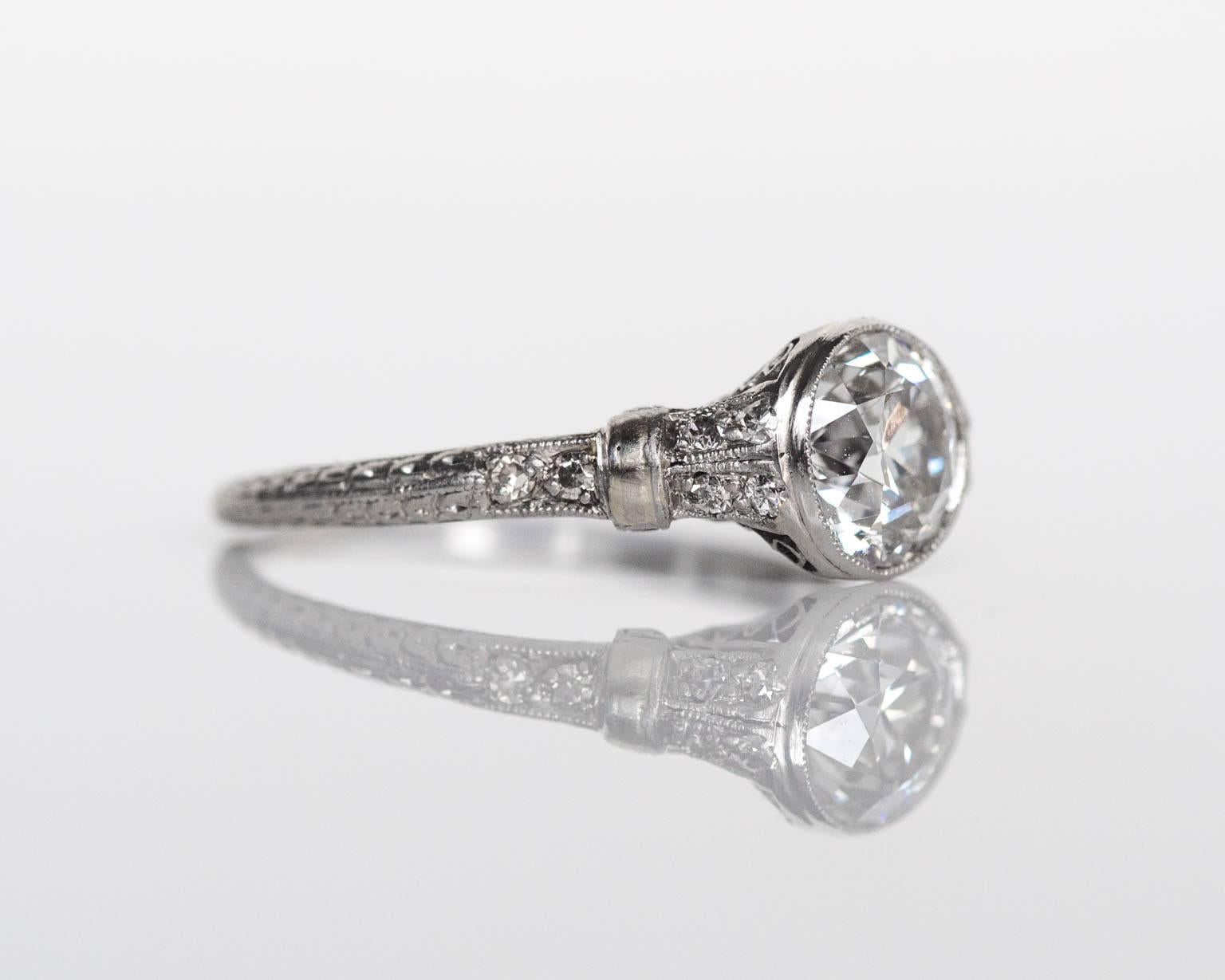 1920s Art Deco Platinum 1.01 carat Diamond Engagement Ring with Side Stones 5