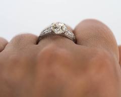 1920s Art Deco Platinum 1.46 Carat Cushion Cut Diamond with Side Stones