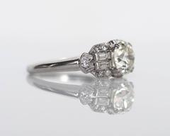Art Deco Platinum 1.10 Carat Diamond with Antique Cut Diamonds, circa 1910