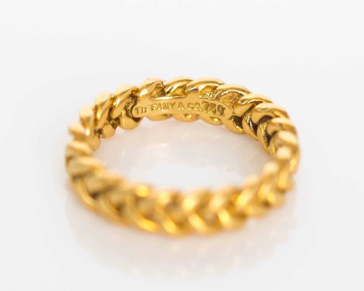 Gorgeous Tiffany & Co. Weave Pattern Band Circa 2005

Item Details: 
Ring Size: 7
Metal Type: 18K Yellow Gold 
Weight: 7.1 grams