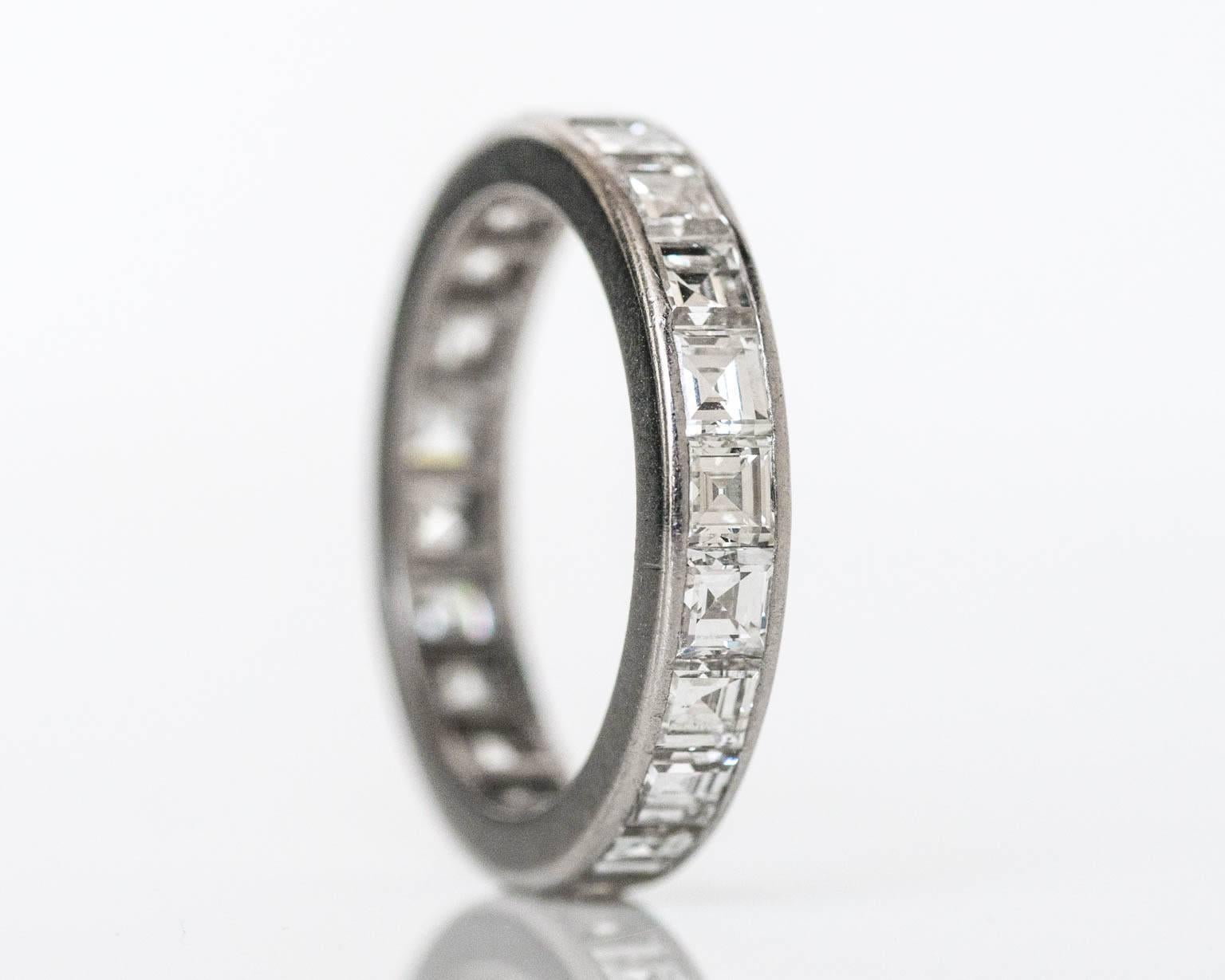 Art Deco Tiffany & Co. Wedding Band

Item Details: 
Ring Size: 5.5
Metal Type: Platinum
Weight: 4.6 grams

Diamond Details:
Shape: Carre Cut (Antique Asscher Cut)
Carat Weight: 3.50 carat, total weight
Color: F
Clarity: VS1