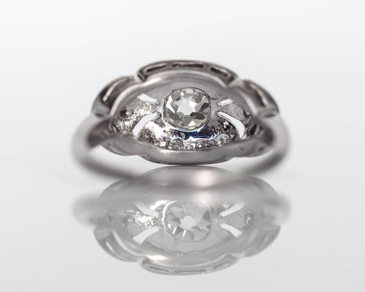 1910s Art Deco GIA Certified .60 carat Diamond Platinum Engagement Ring In Excellent Condition In Atlanta, GA