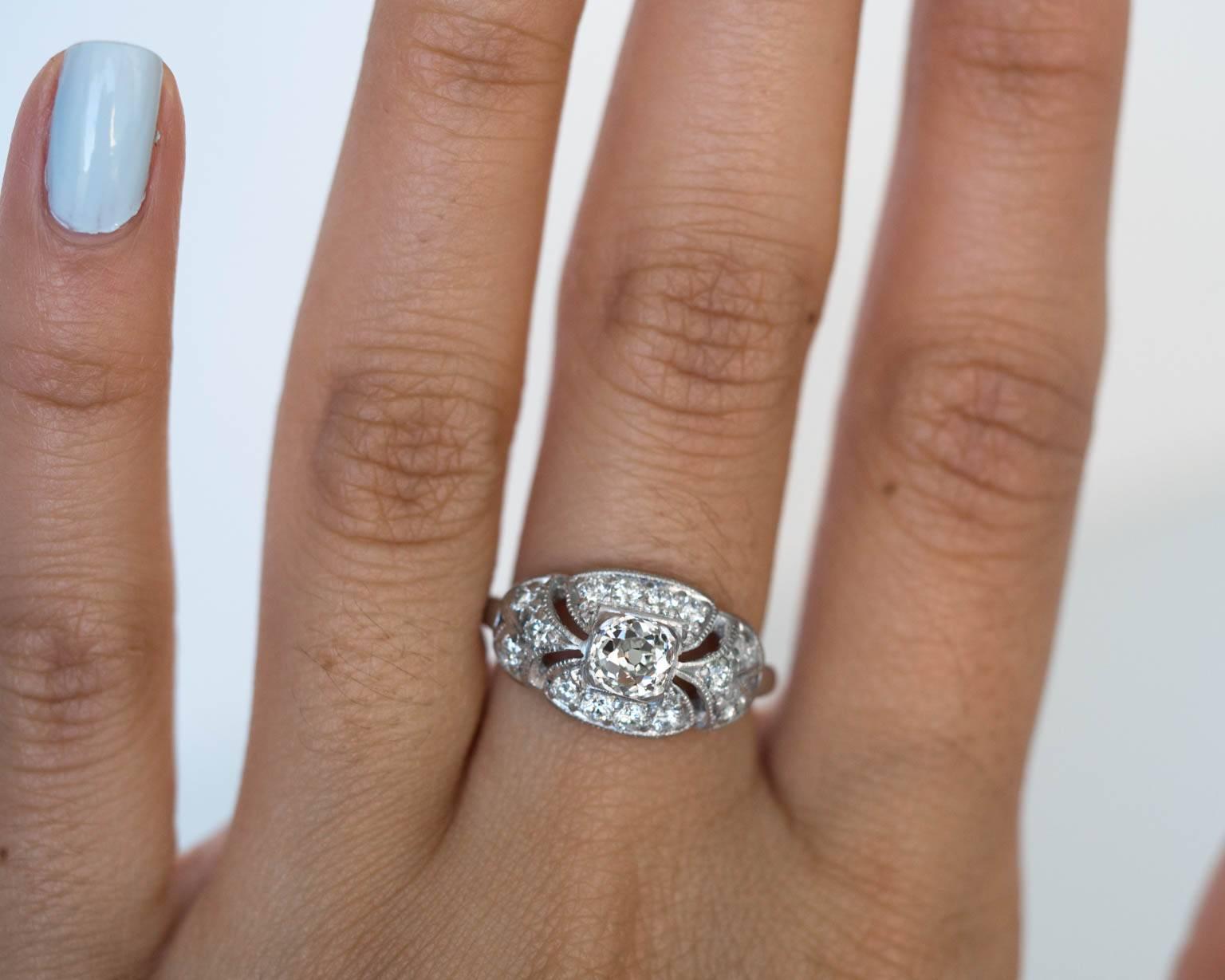 1910s Art Deco GIA Certified .60 carat Diamond Platinum Engagement Ring 4