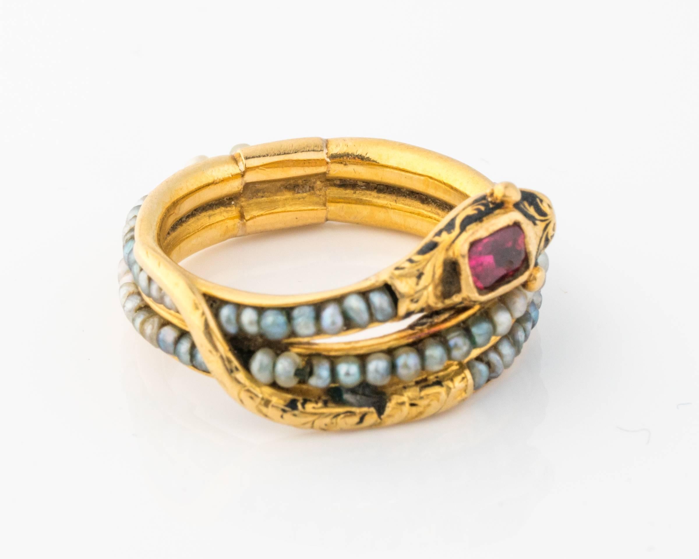 Very unusual mourning ring from circa 1882, celebrating the life of an individual named Jane Gordon. The ring has an inscription behind the Serpent head that reads: 