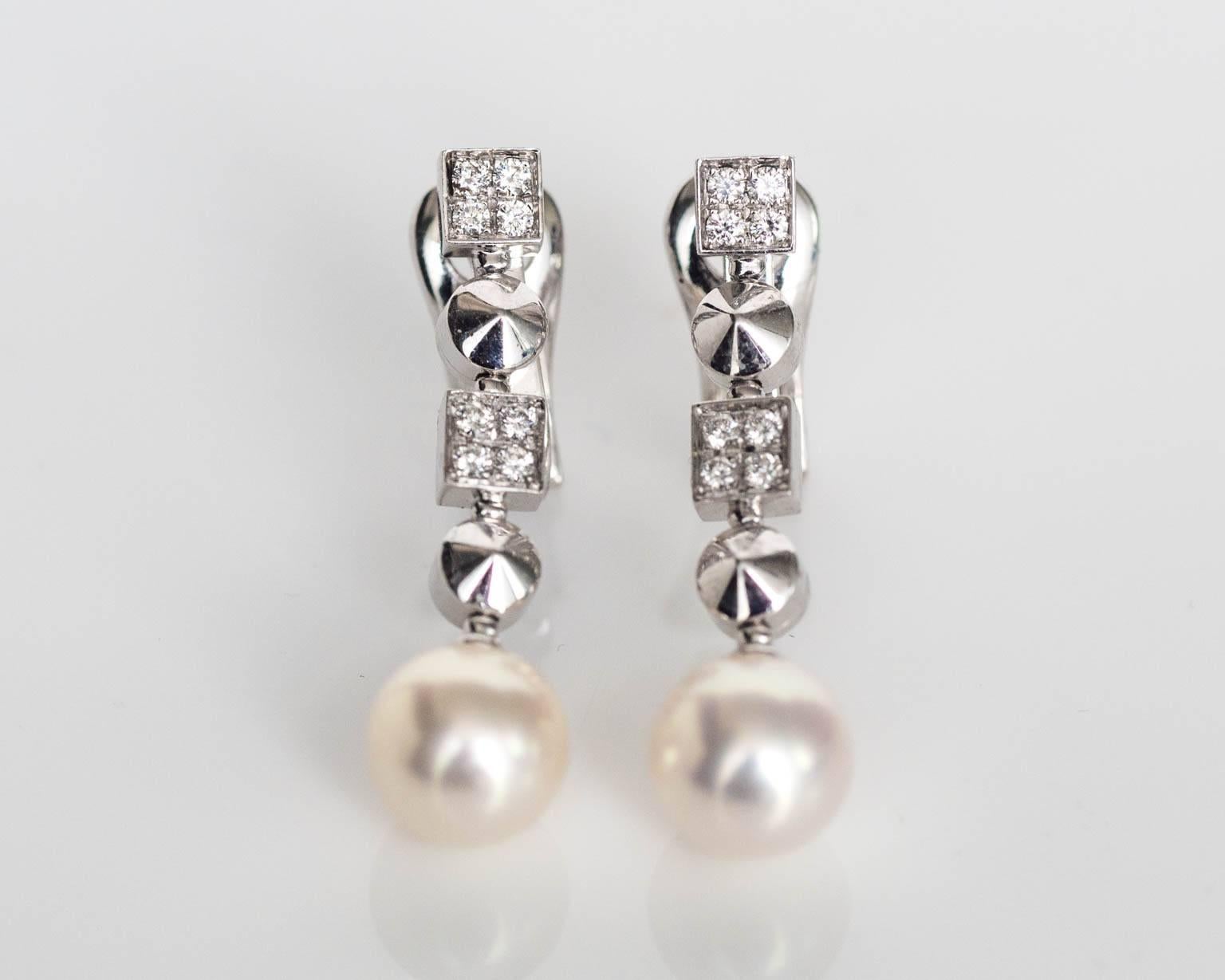 BVLGARI Earrings Lucea Design with .75cttw diamonds and 2 natural pearls

Item Details: 
Metal Type: 18K White Gold
Weight: 11.1 grams

Diamond Details:
Carat Weight: .75cttw

Natural Pearls (2)
