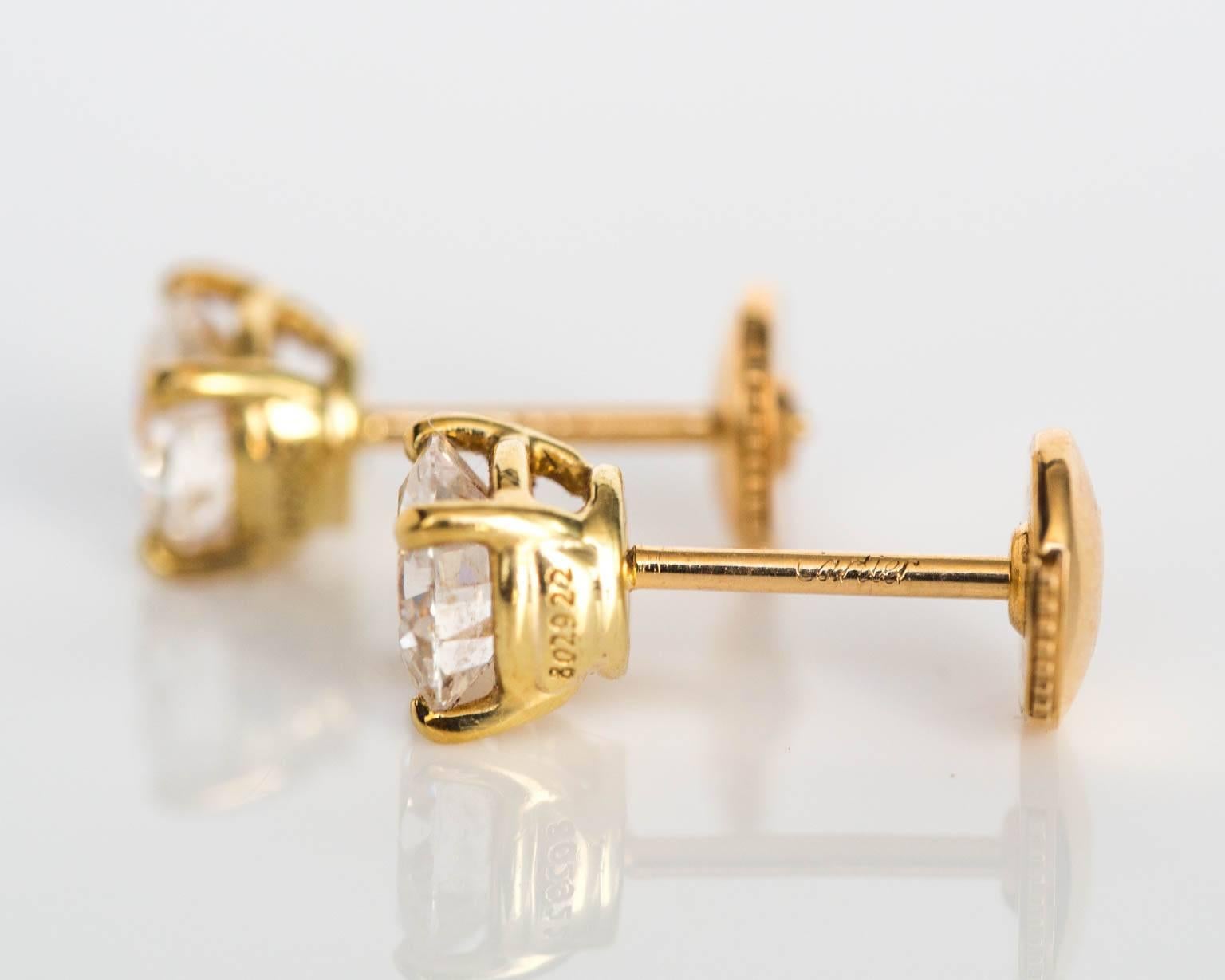 2010 18K Yellow Gold Cartier Diamond Solitaire Earrings In Excellent Condition In Hicksville, NY