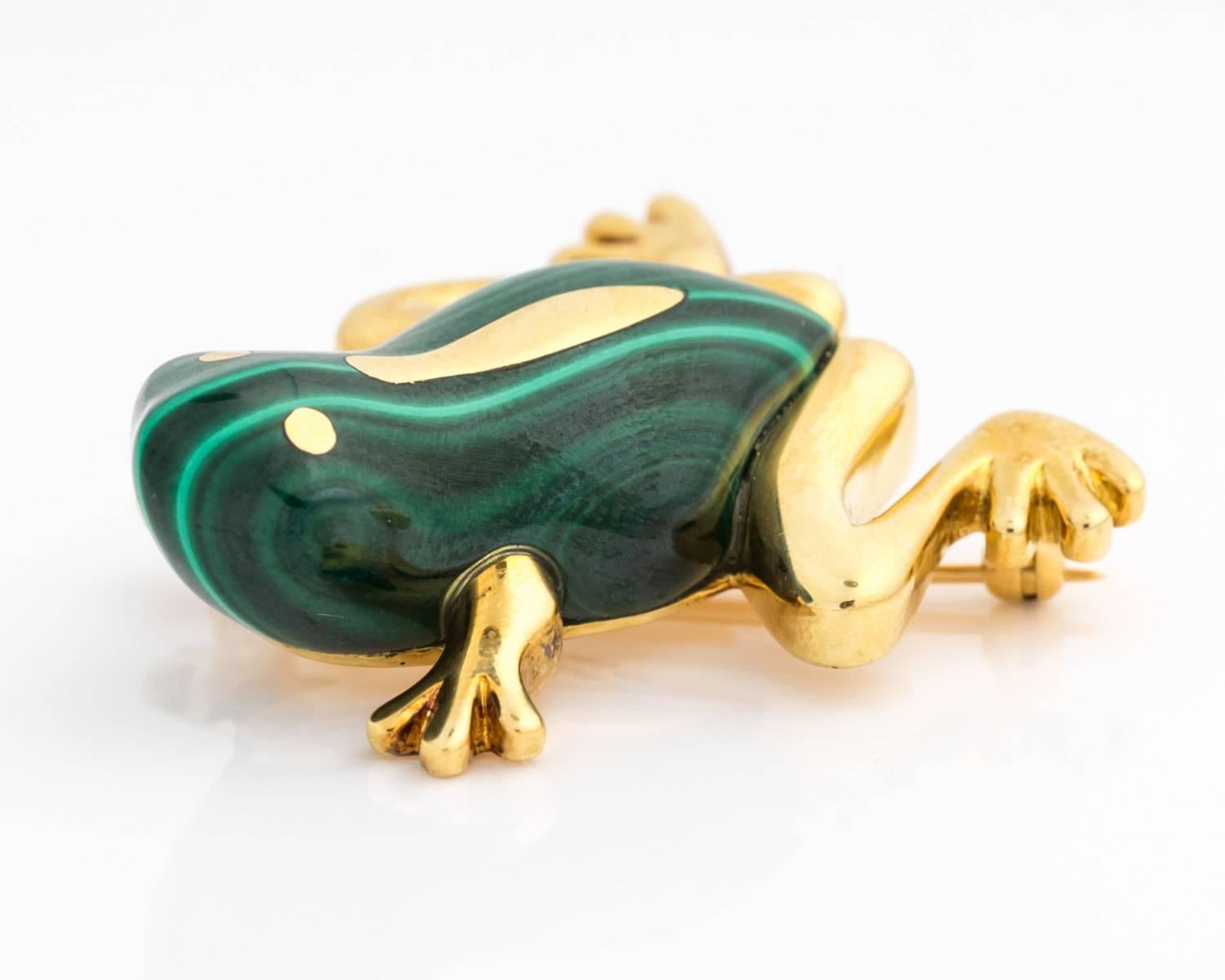 This Tiffany & Co. piece is a limited edition brooch from the Hong Kong Tiffany boutique. The frog is crafted in solid 18 karat yellow gold totaling to 19.4 grams. This pin is better worn on a blazer or jacket because of its size and weight. The