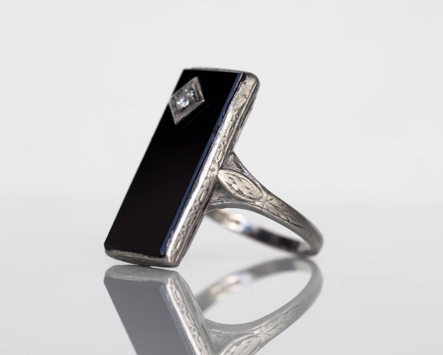 Item Details: 
Ring Size: 3.5
Metal Type: Platinum
Weight: 4.4 grams

Diamond Details:
Shape: Old European Cut
Carat Weight: .03 carat
Color: G
Clarity: SI1