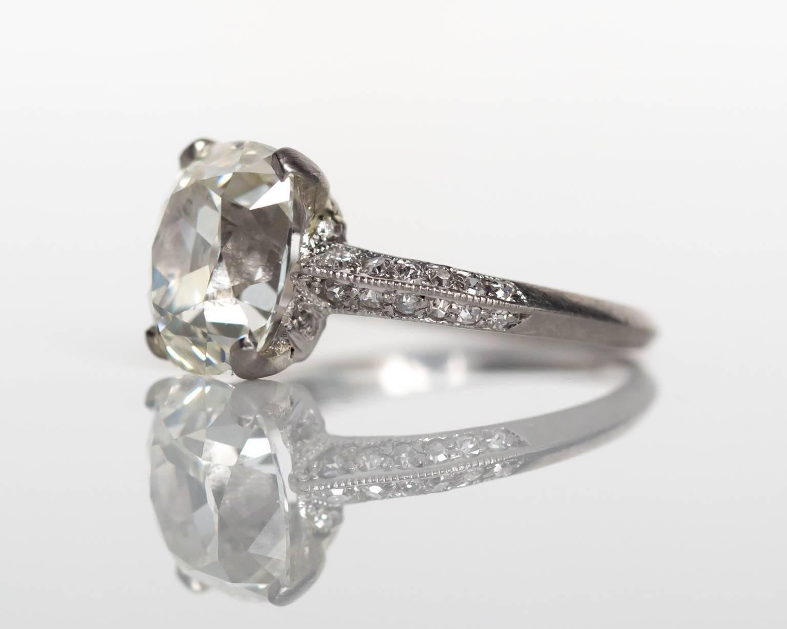Item Details: 
Ring Size: 4.5
Metal Type: Platinum
Weight: 3.1 grams

Center Diamond Details:
GIA CERTIFIED Center Diamond - Certificate #6177577894
Shape: Old Mine Brilliant
Carat Weight: 2.72 carat
Color: I
Clarity: VS1

Side Stone