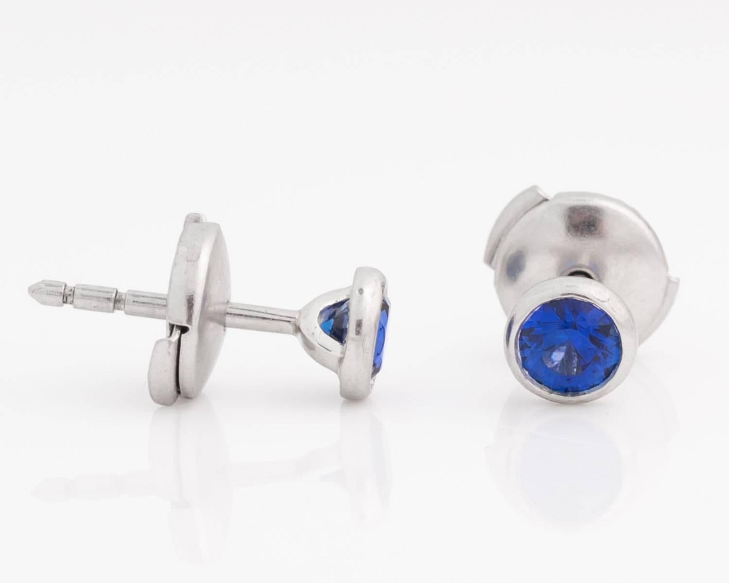 Elsa Peretti Collection Purple-Blue Sapphire Earrings
Platinum Crafted 1.3 grams, Bezel Set (held by U-shaped gallery, allowing bottom of sapphires to be viewed)
Unique Backings on these earrings - rounded frame which opens upon pushing the two