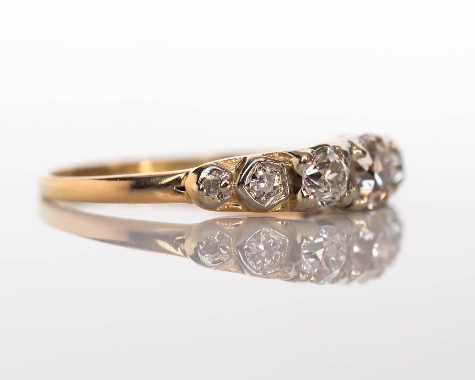 yellow gold ring with platinum prongs