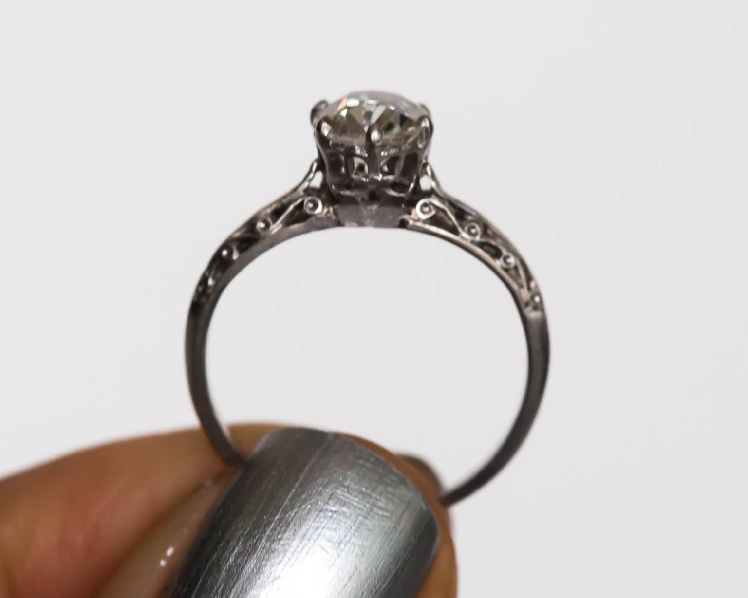 1900s Edwardian Platinum .83 Carat Antique Cushion Cut Diamond Engagement Ring In Excellent Condition In Atlanta, GA