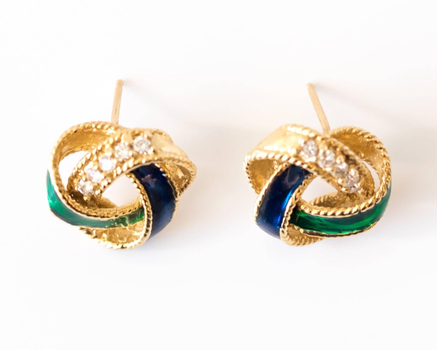 Earring Details:
Metal Type: 14 karat Yellow Gold
Size: 15.5 mm
Weight: 6.65 g

Diamond Details:
Cut: Round
Carat Weight: .10 carat each x 2 = .20 carats total weight
Color: G
Clarity: VS

1950s 
Feature Blue and Green Enamel
