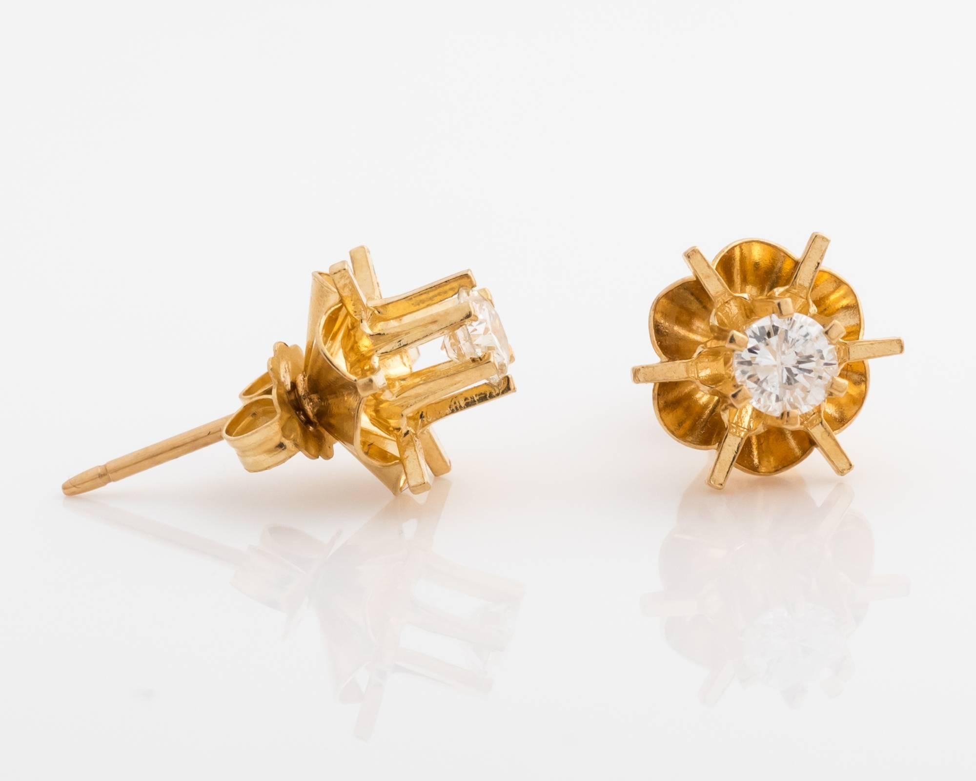 

1950s Old European Diamond Studs
Crafted in 14 Karat Yellow Gold
Fresh, Unique Design 
Great Condition - no surface scratches on the diamonds, nor dents or abrasions on the gold
Tulip Design with a High Mount and Extended 